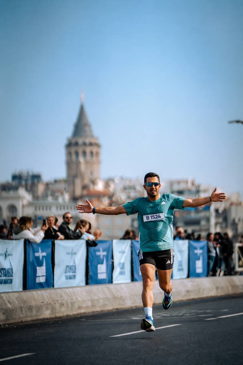 Zavosh running with Galata Tower behind him