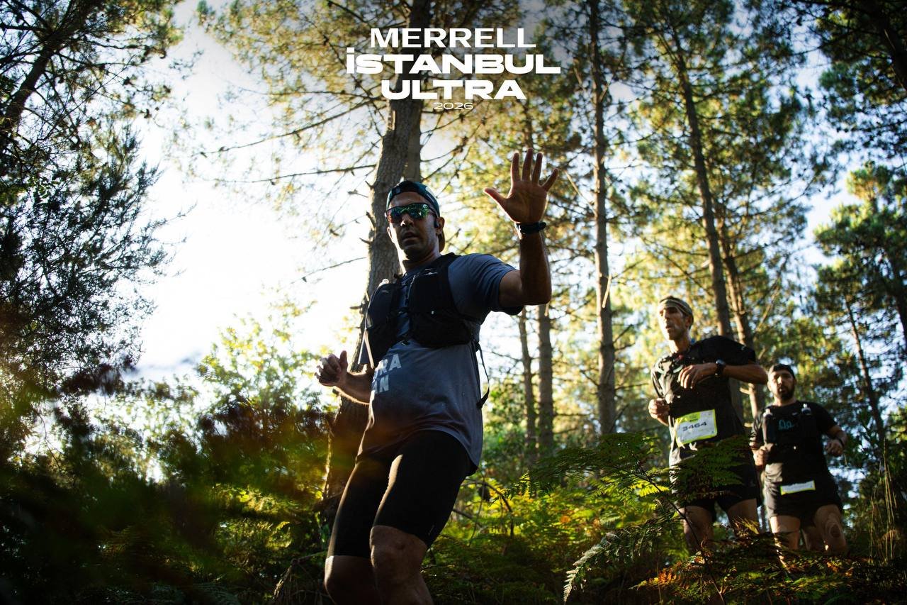 Zavosh competing in a wooded ultra race